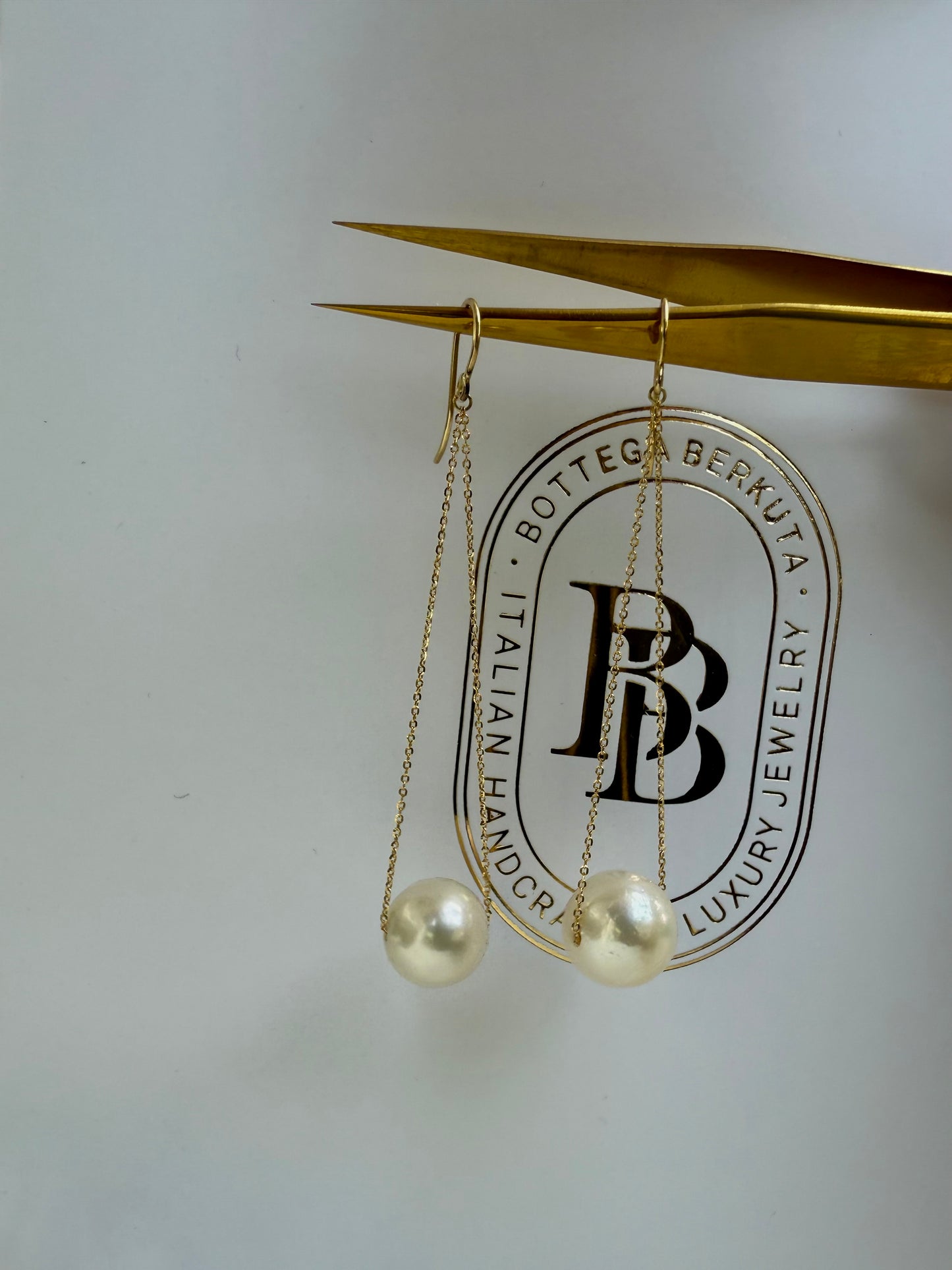 Orecchini pendenti di perle