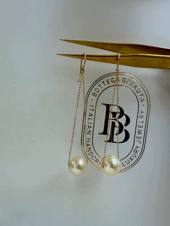 Orecchini pendenti di perle