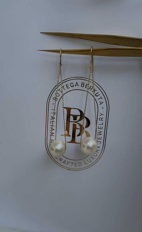 Orecchini pendenti di perle