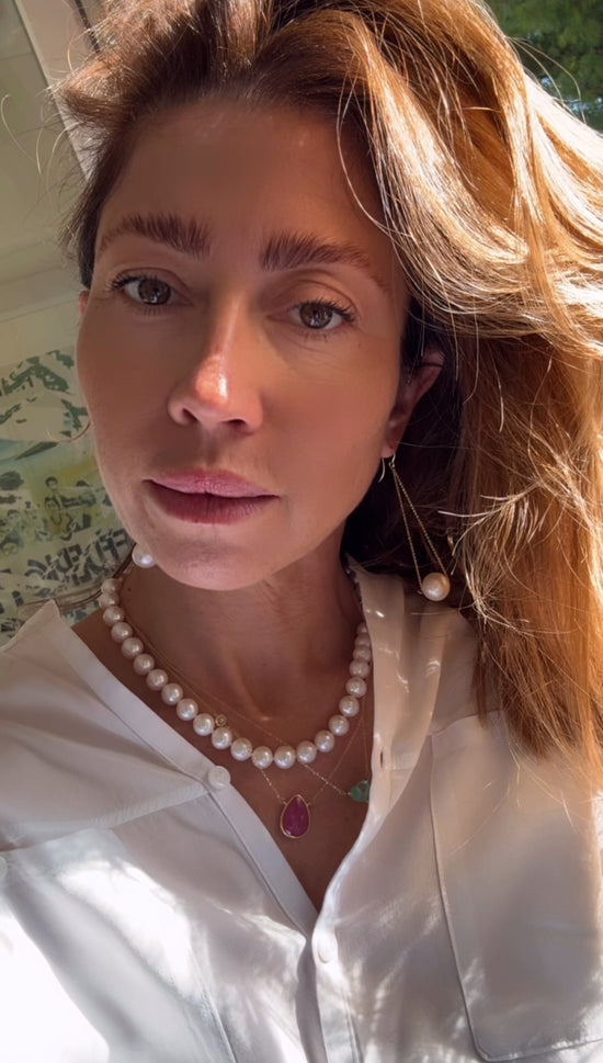 Orecchini pendenti di perle