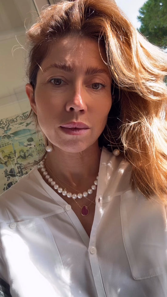 Orecchini pendenti di perle