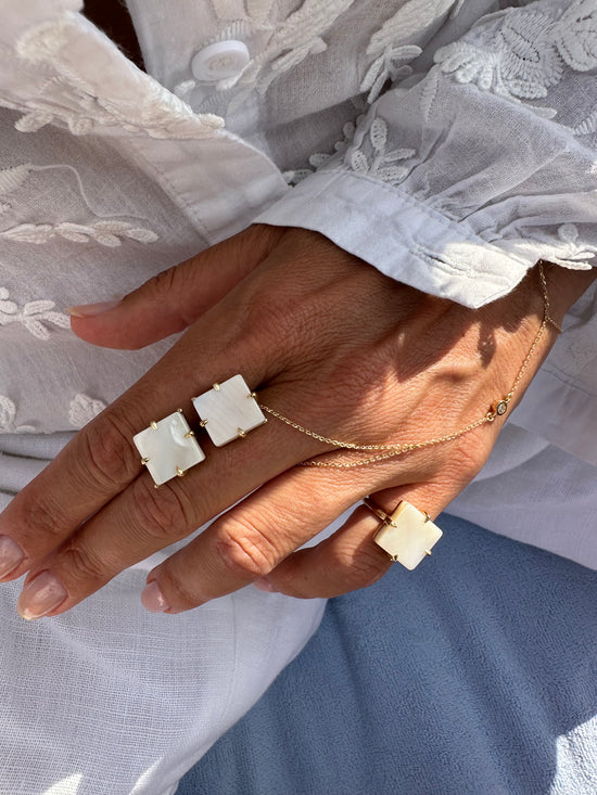 Baciamano in oro con brillantino