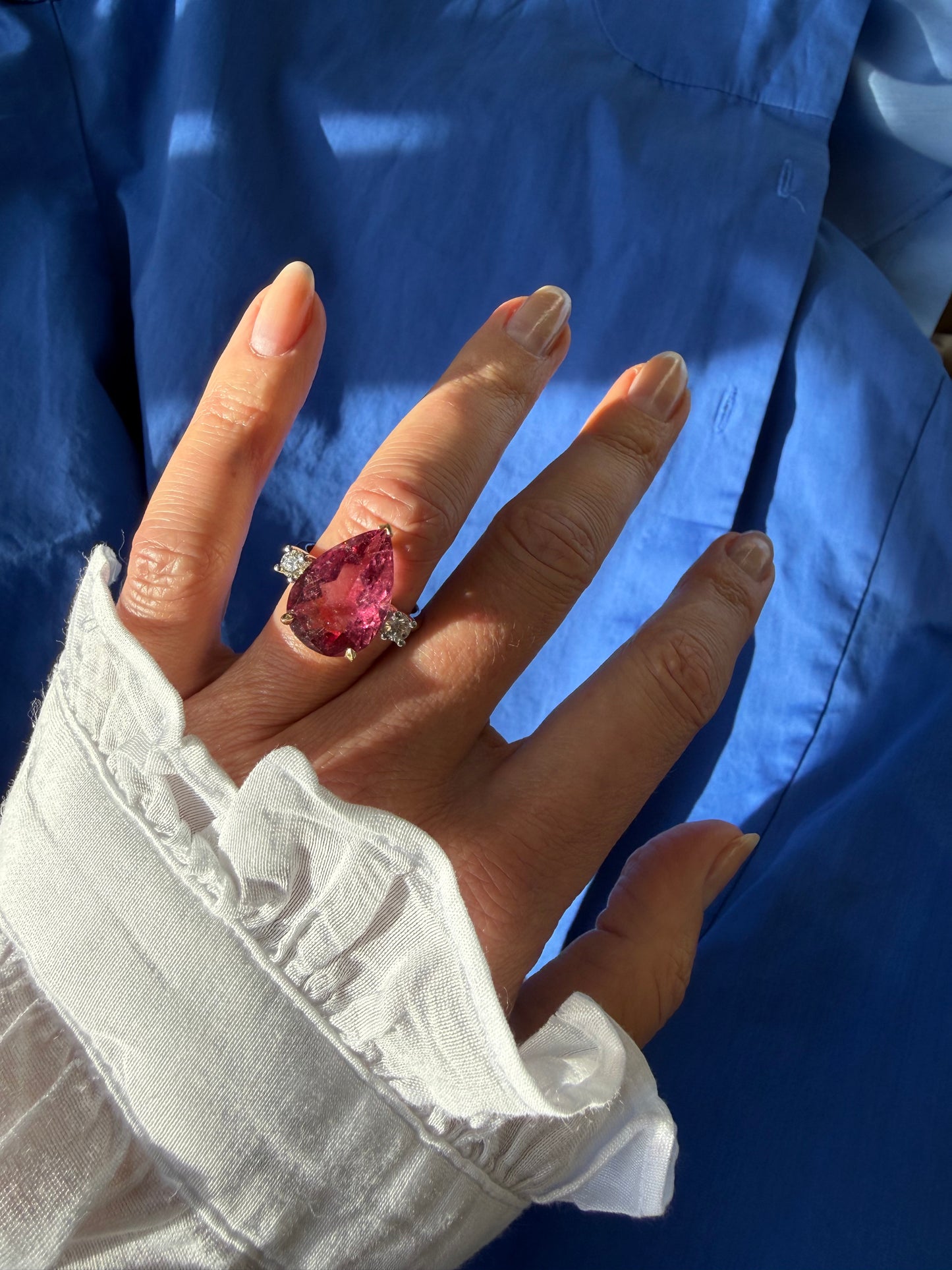 Ring with tourmaline and two diamonds