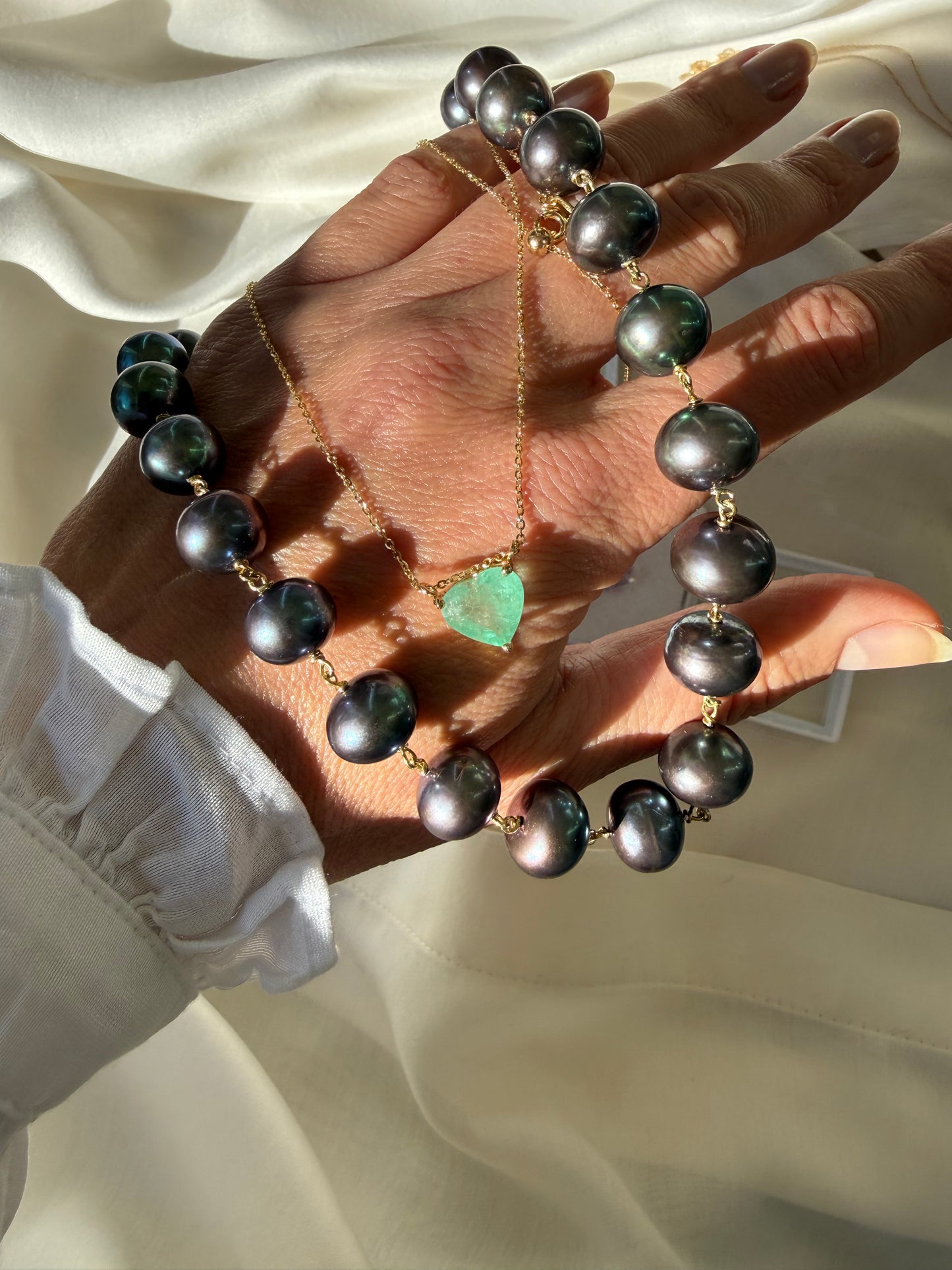 Ожерелье с изумрудом в форме сердца 3.27