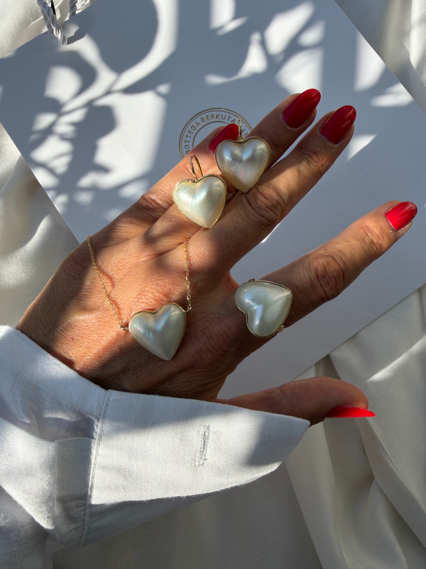 Orecchini con perla mabe a cuore