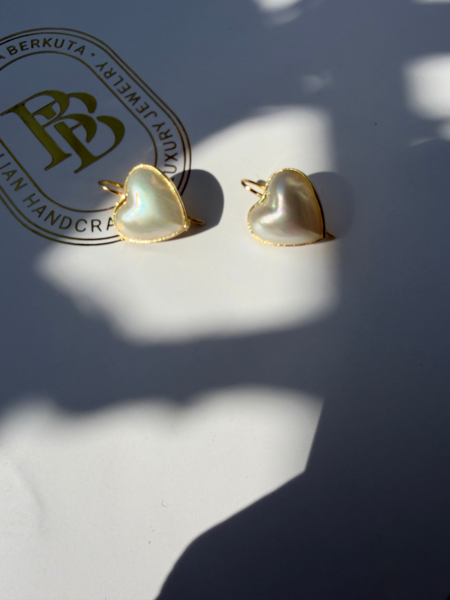 Orecchini con perla mabe a cuore