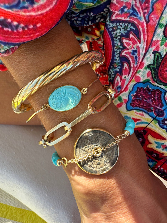 Bracciale di turchese con moneta