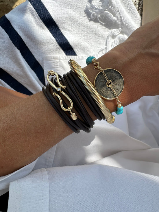 Bracciale di turchese con moneta