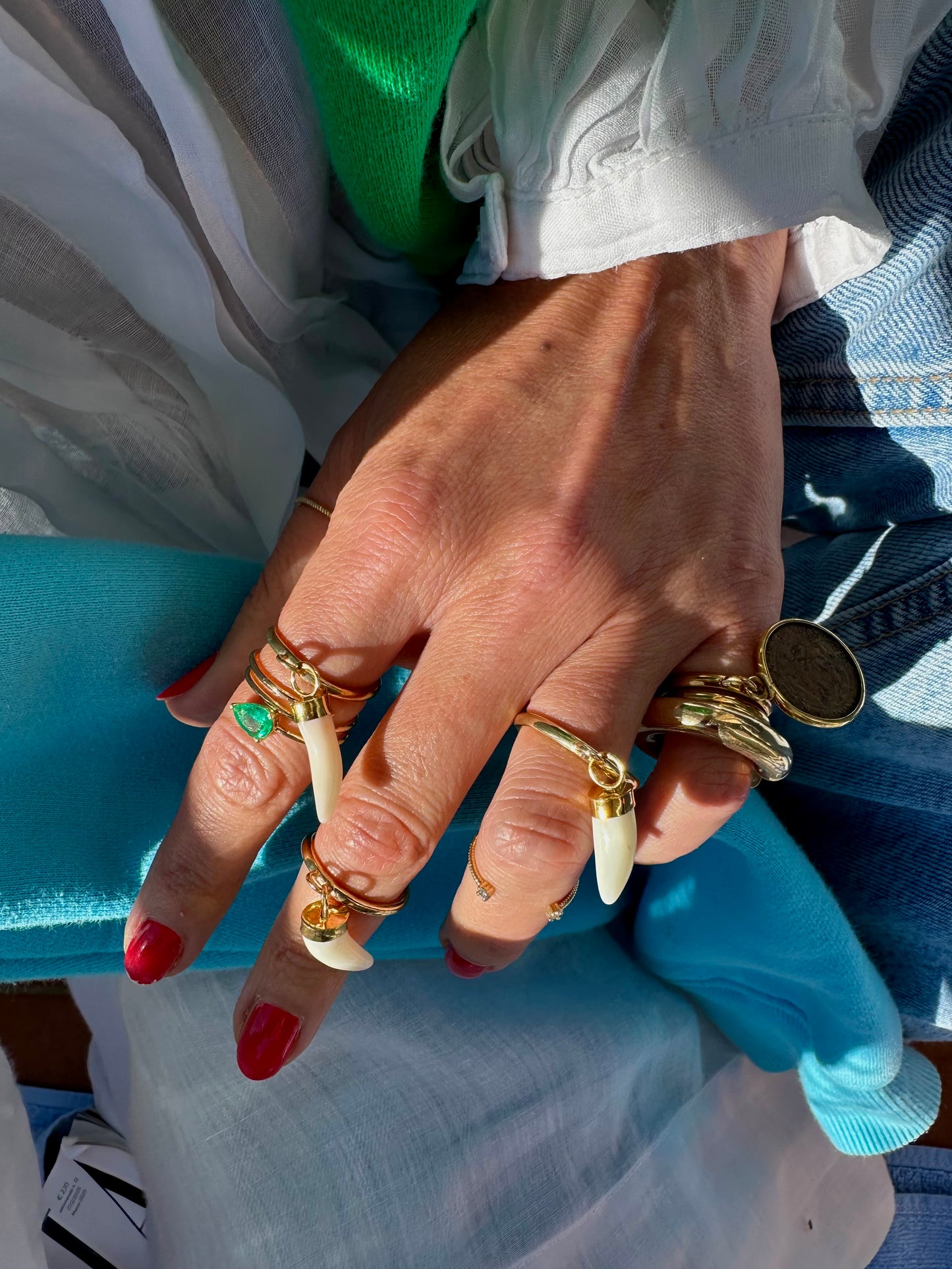 Silver ring with white coral fang
