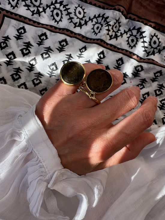 Anello con moneta a ciondolo