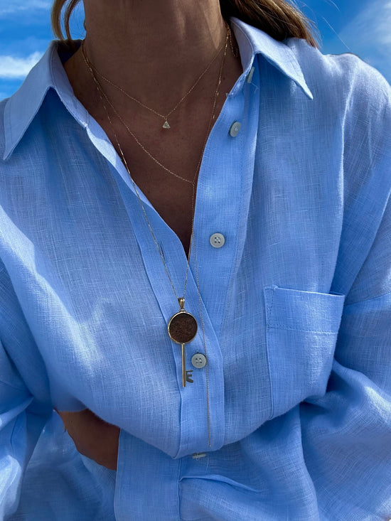 Chiave con moneta antica