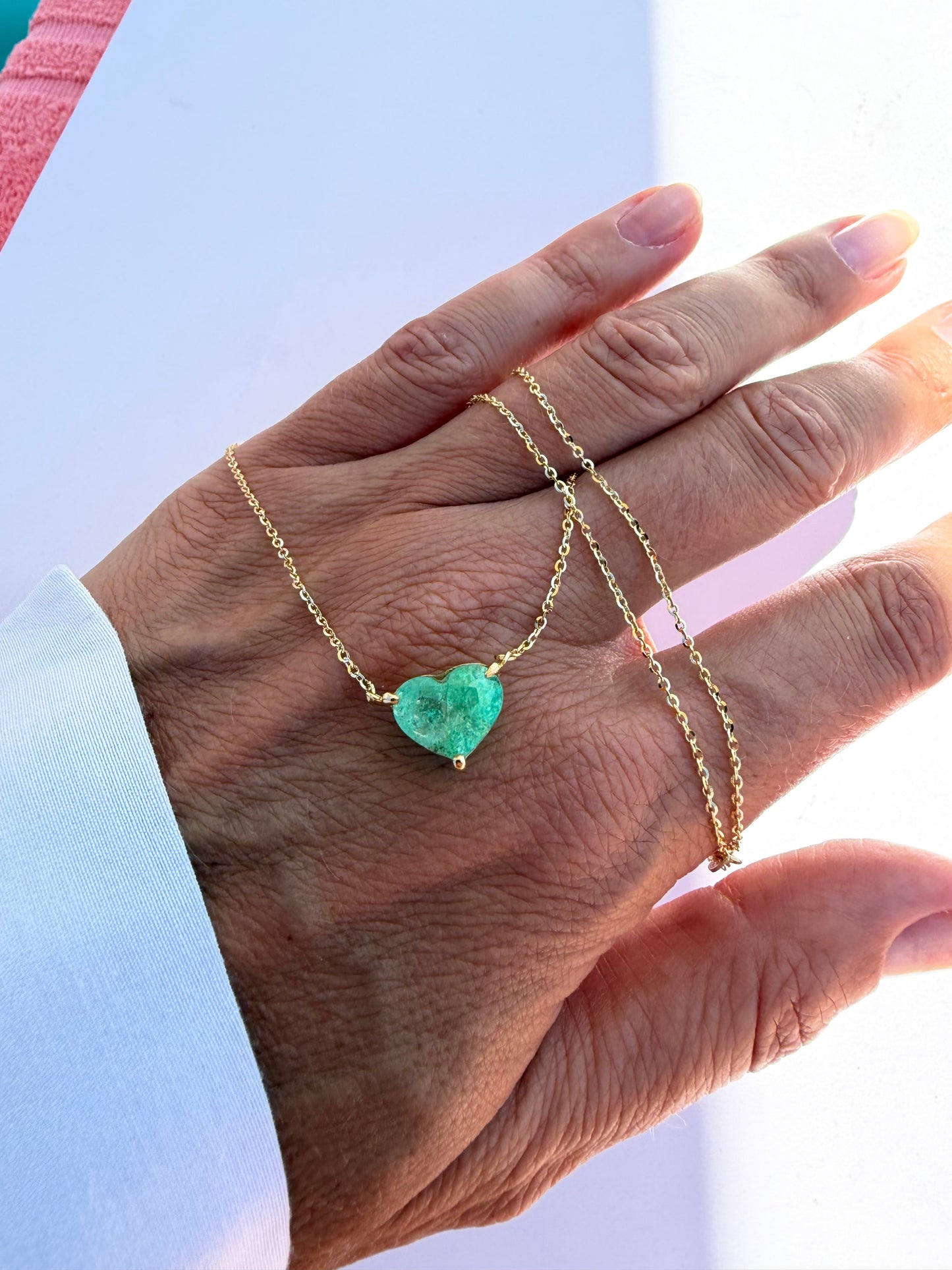 Catenina con smeraldo a cuore 3.28
