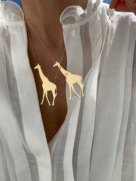 Giraffa in oro