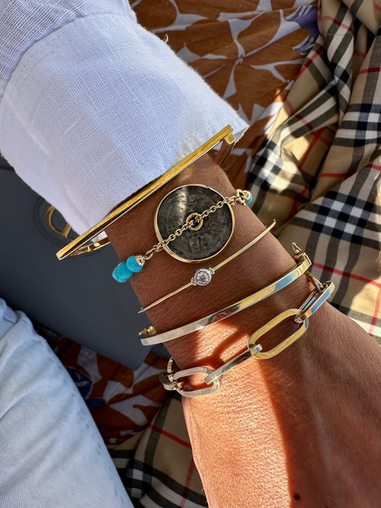 Bracciale di turchese con moneta