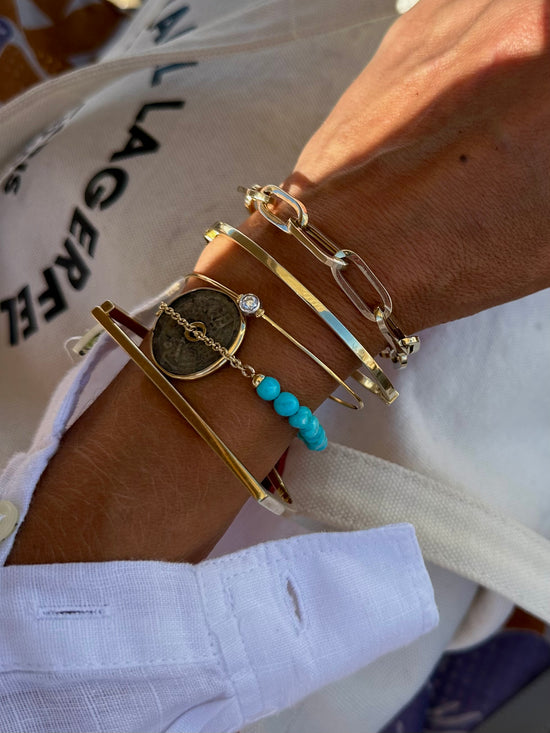 Bracciale di turchese con moneta